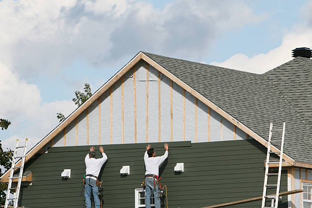 Professional Siding Installation technician working in Quincy, OH